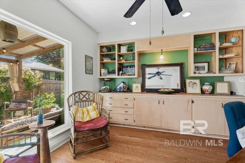 Located on a beautiful corner lot beneath mature live oaks, this - photo 25