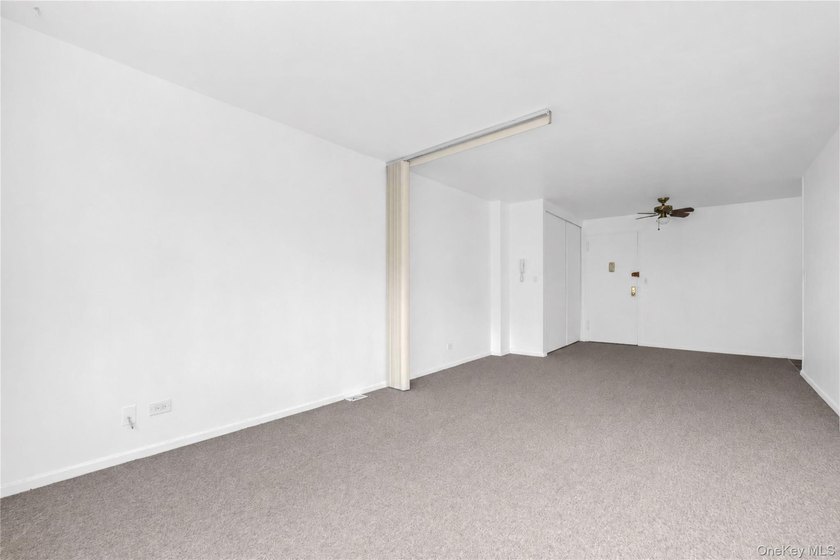 Welcome to this spacious and well-maintained co-op studio in the - photo 12