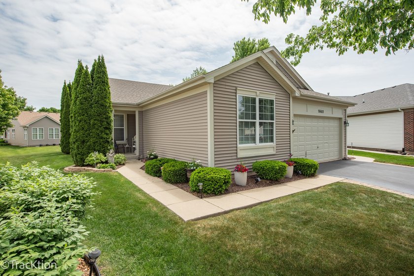 This is a charming Greenbriar model home with an extended family - photo 2