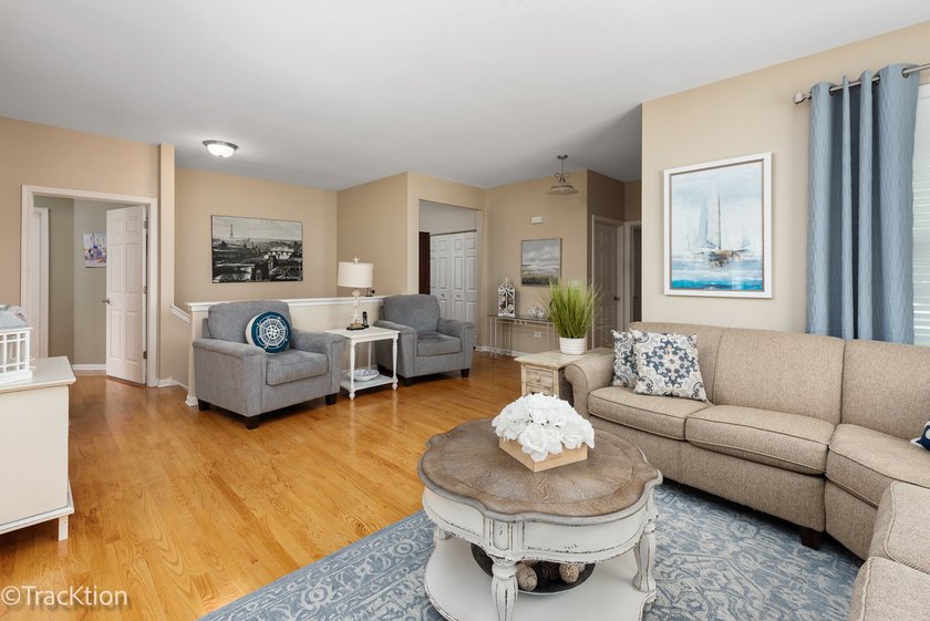 This is a charming Greenbriar model home with an extended family - photo 4