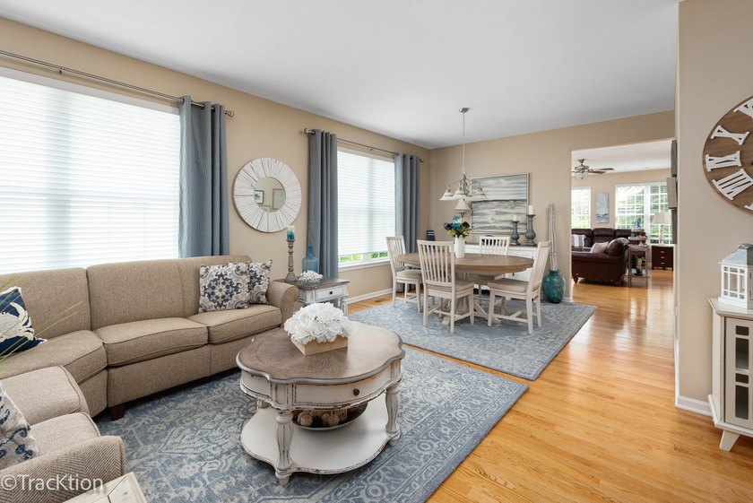 This is a charming Greenbriar model home with an extended family - photo 5