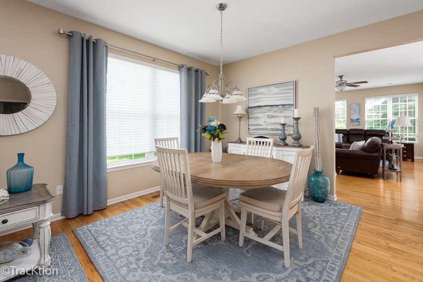 This is a charming Greenbriar model home with an extended family - photo 6