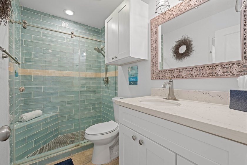 Welcome to this stunning Key Allegro condo, where serene water - photo 9