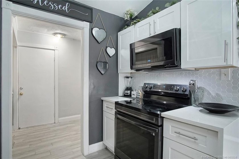 Welcome home to this 3 bedroom 2 bath 2 car garage with Pool - photo 8