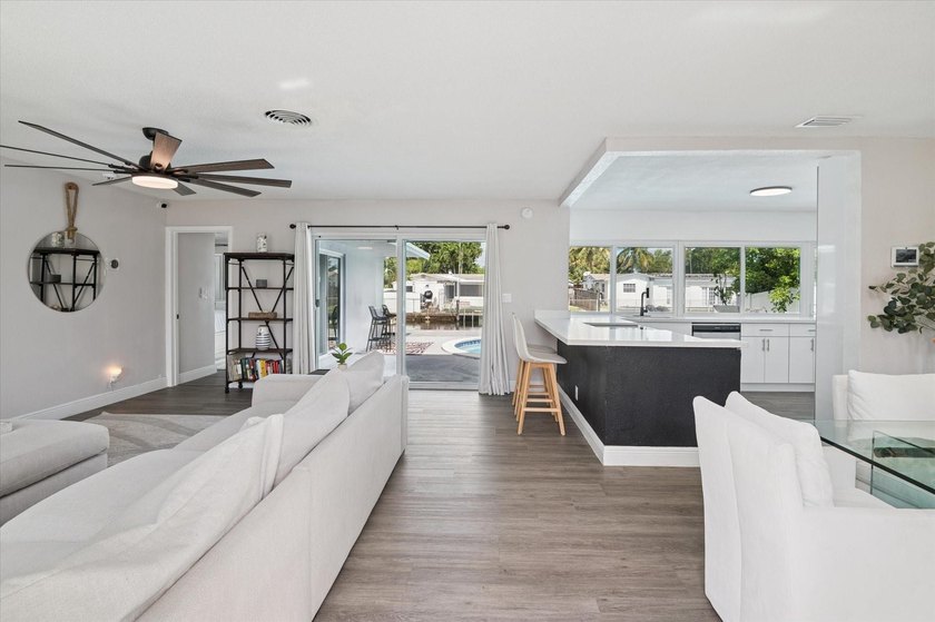 All remodeled with a new open kitchen and large impact sliders - photo 5