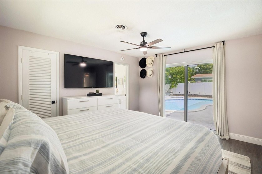 All remodeled with a new open kitchen and large impact sliders - photo 10