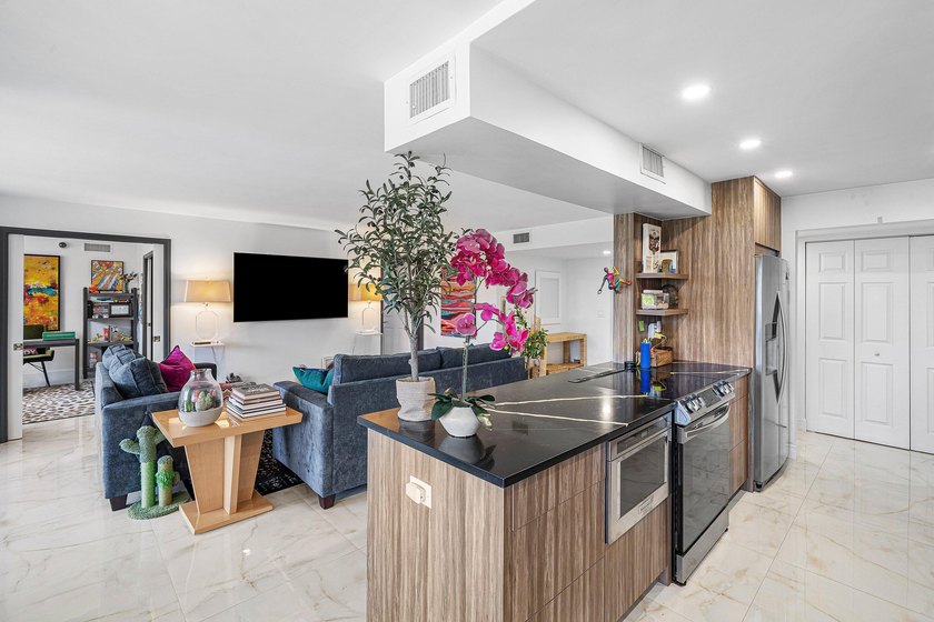 Welcome to this beautifully renovated residence featuring 2 - photo 9