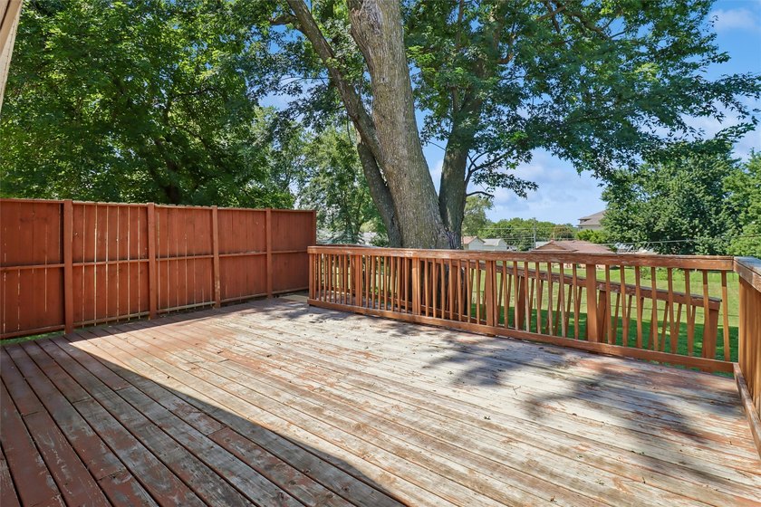 Welcome to this all-brick ranch home! The bright sunny living - photo 22