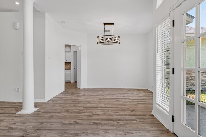 This lovely 2051 sq. ft. stucco home sits on a large lot in the - photo 7