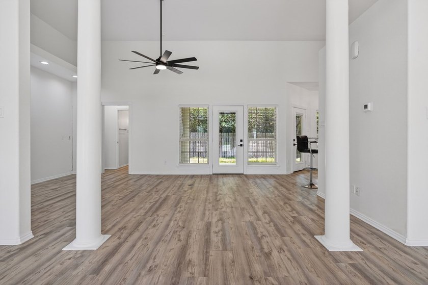 This lovely 2051 sq. ft. stucco home sits on a large lot in the - photo 8