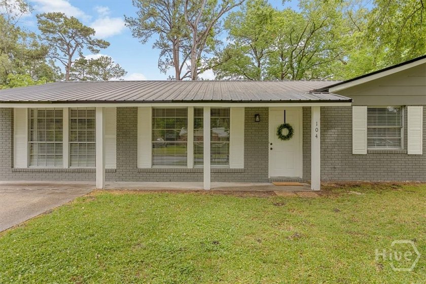 New Price! Welcome home to this beautifully renovated all-brick - photo 2