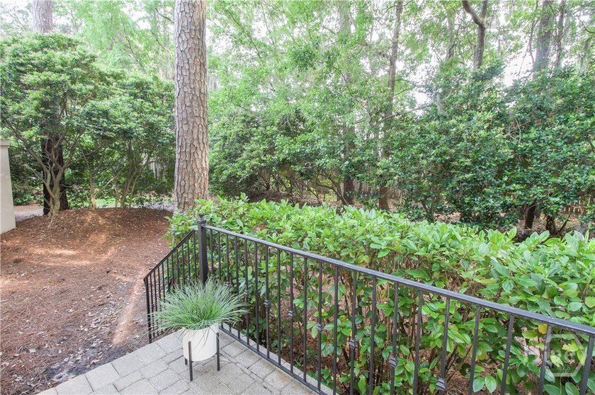 An exceptional townhome nestled within the gated enclave of - photo 5