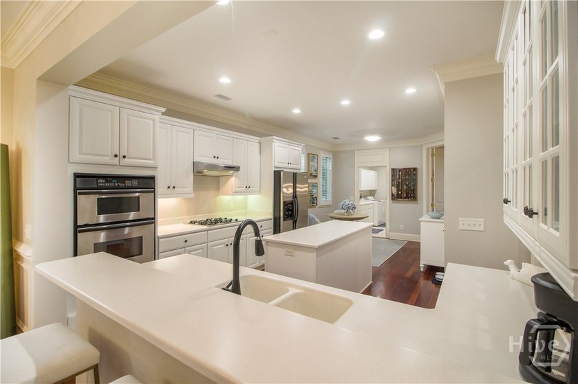 An exceptional townhome nestled within the gated enclave of - photo 6
