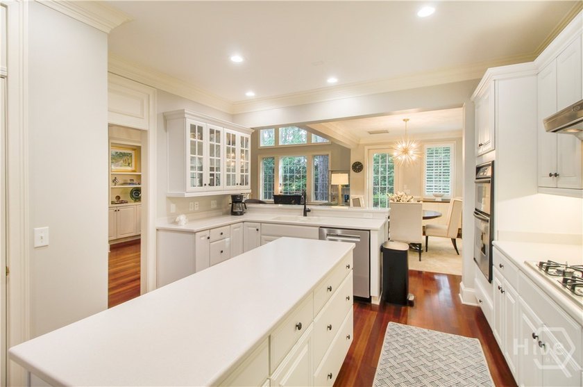 An exceptional townhome nestled within the gated enclave of - photo 8