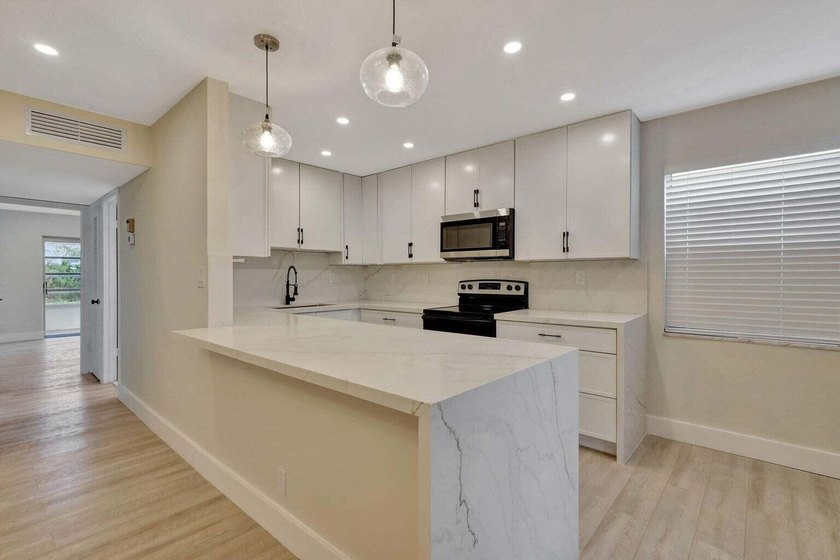 Experience elevated resort-style living at 802 Burgundy Q, a - photo 2