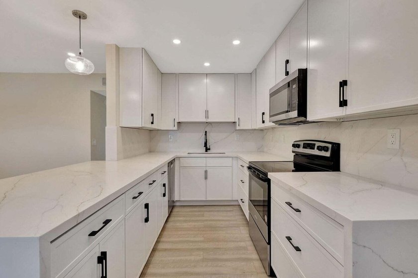 Experience elevated resort-style living at 802 Burgundy Q, a - photo 3