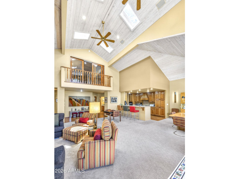 Majestic home perched on a large custom lot with tons of windows - photo 13