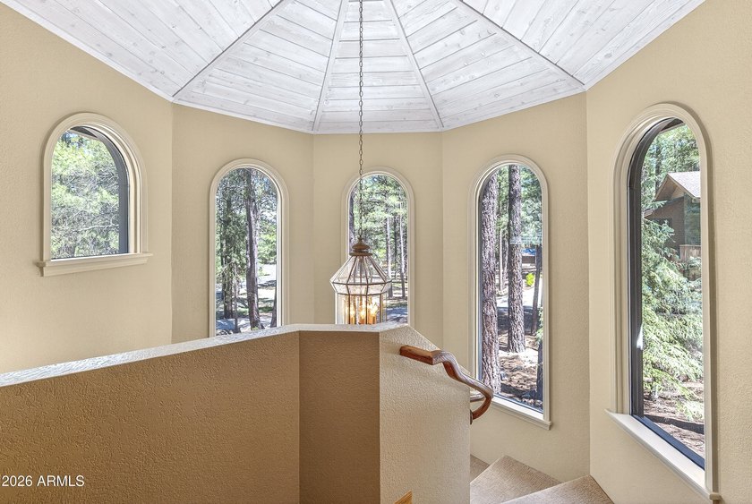 Majestic home perched on a large custom lot with tons of windows - photo 19
