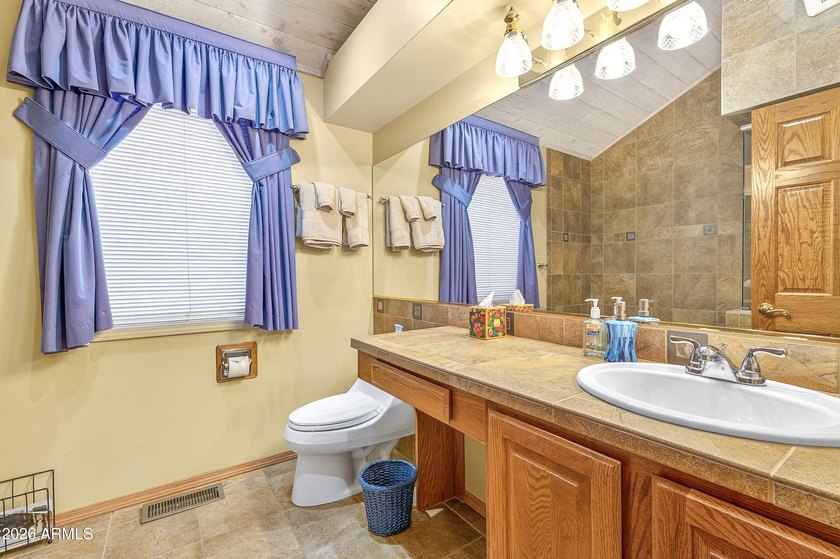 Majestic home perched on a large custom lot with tons of windows - photo 34