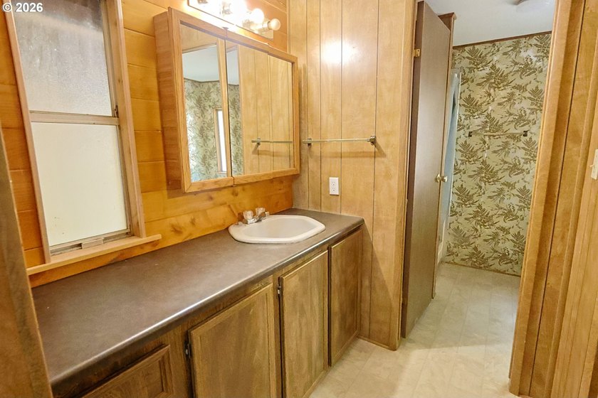 Welcome to Greene Acres. This 3-bedroom, 2-bath home sits on - photo 38