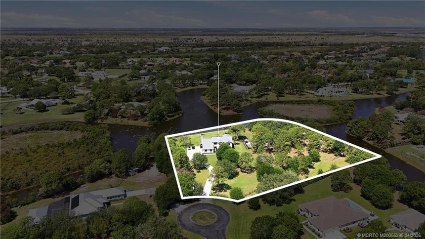 Experience privacy and luxury in one of Palm City's most - photo 5