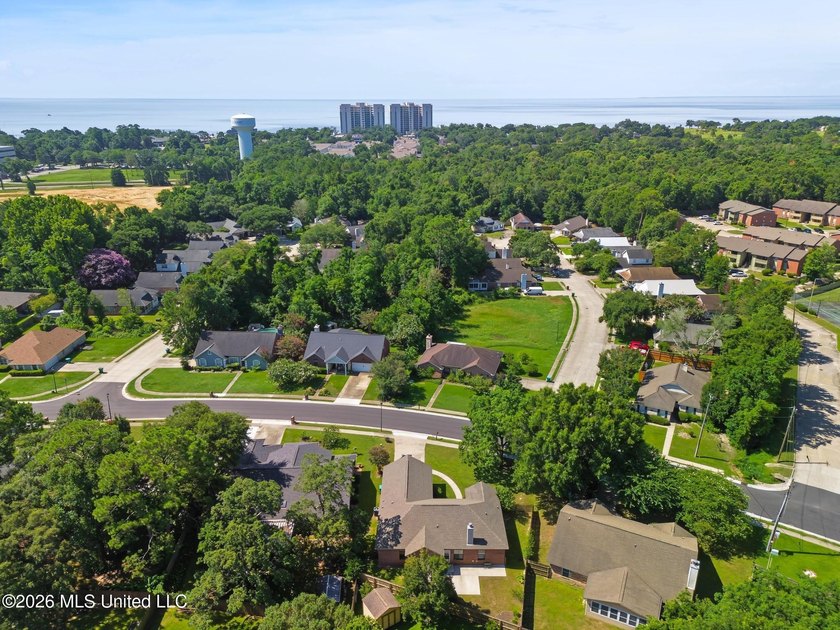 Move-in ready and just minutes from the beach! This beautiful - photo 2
