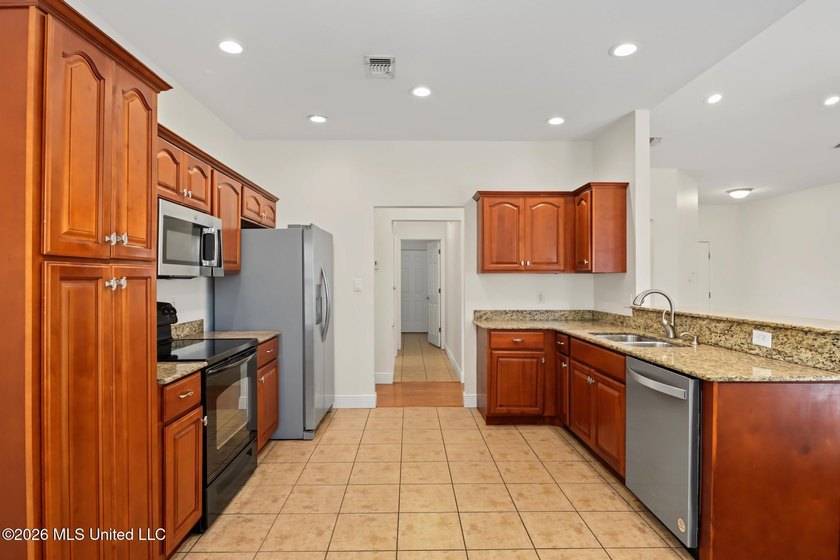 Move-in ready and just minutes from the beach! This beautiful - photo 6
