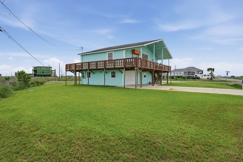 Nestled on two spacious lots in Holiday Beach, this fully - photo 3