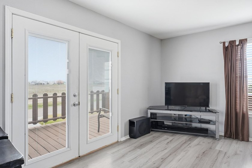 Nestled on two spacious lots in Holiday Beach, this fully - photo 5