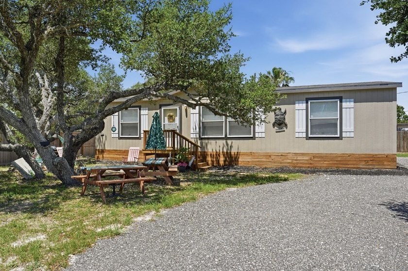 *HOME *DOUBLE LOT *FENCED *BOAT BARN Nestled beneath a canopy of - photo 5