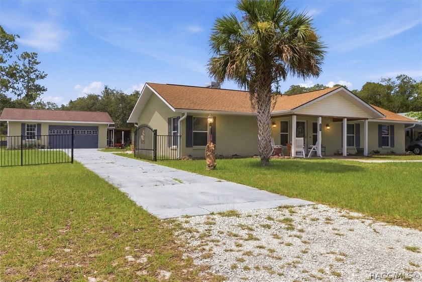 Welcome home to this inviting three-bedroom, two-bath with - photo 2