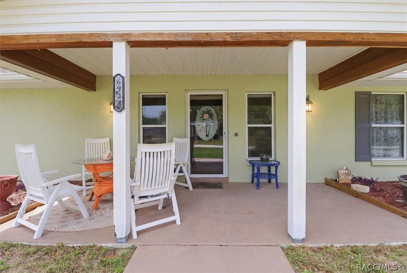 Welcome home to this inviting three-bedroom, two-bath with - photo 7