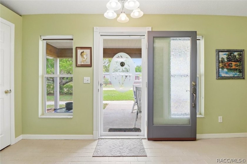 Welcome home to this inviting three-bedroom, two-bath with - photo 8