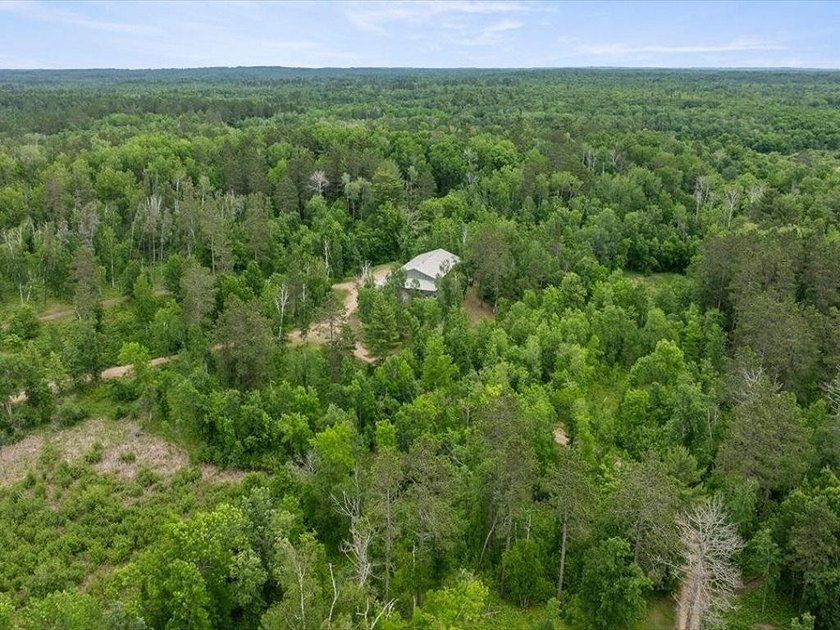 County Home on 12.54 Acres! This versatile property offers - photo 2