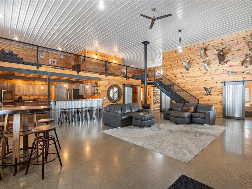 County Home on 12.54 Acres! This versatile property offers - photo 6