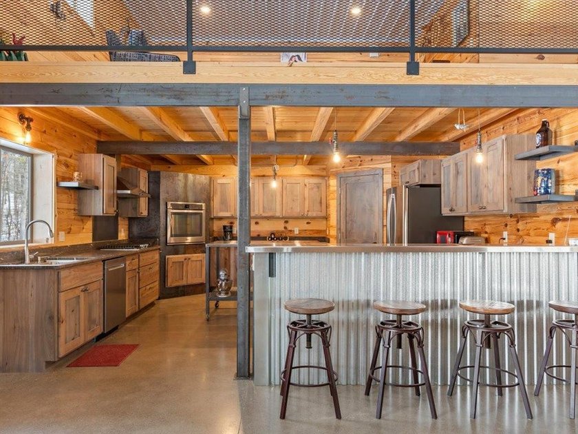 County Home on 12.54 Acres! This versatile property offers - photo 7