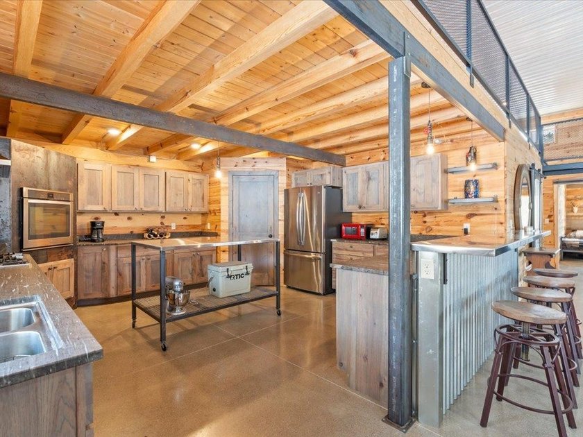 County Home on 12.54 Acres! This versatile property offers - photo 9