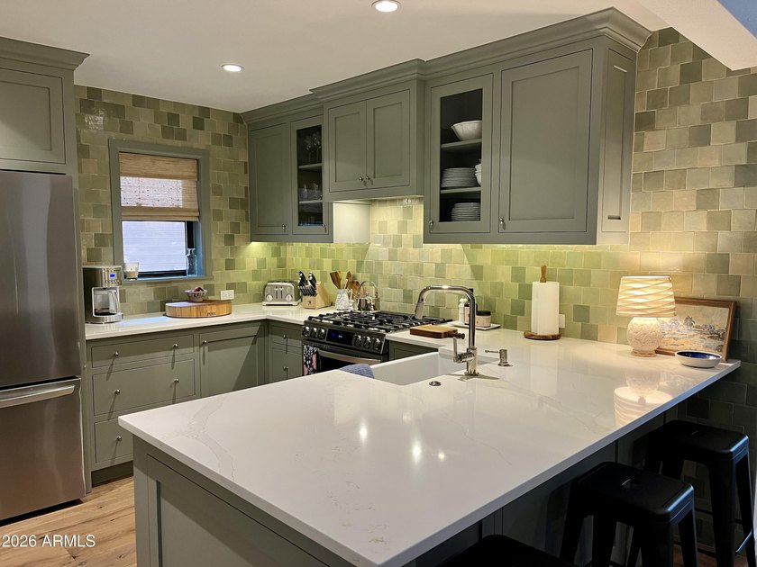 Discover this stunningly remodeled home in the highly - photo 4