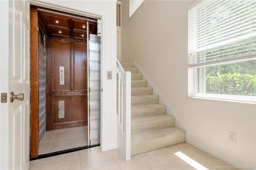This is a spacious two bedroom, two bath Villa with elevator in - photo 4