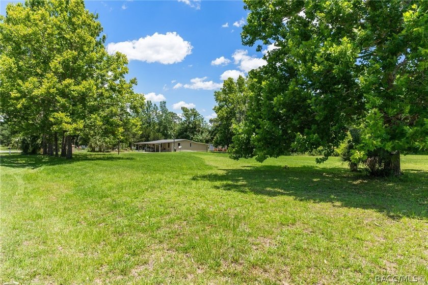 Discover the potential of this 2.14-acre corner lot property in - photo 4