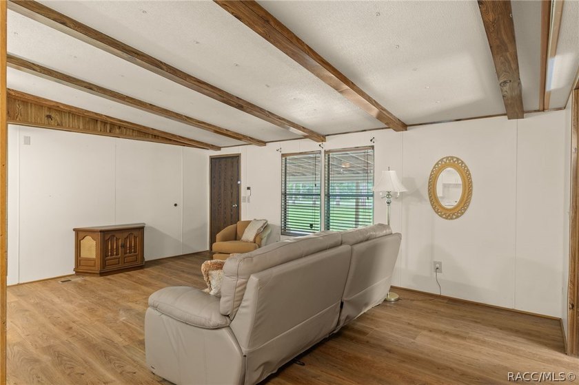 Discover the potential of this 2.14-acre corner lot property in - photo 9
