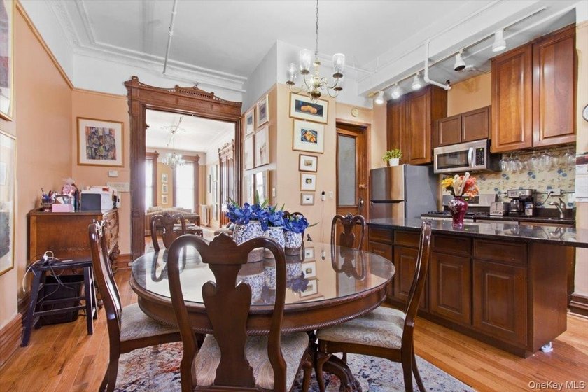 This meticulously maintained residence offers a spacious - photo 12
