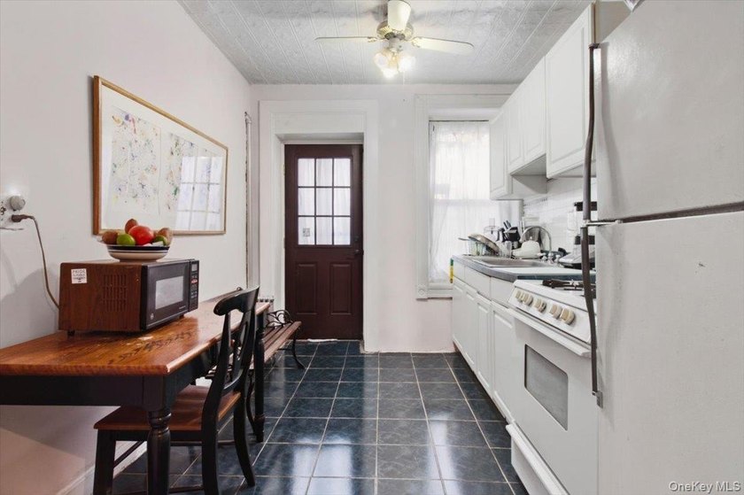 This meticulously maintained residence offers a spacious - photo 13
