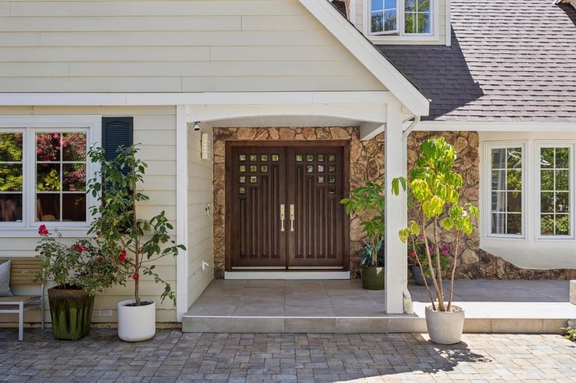 Welcome to 20210 La Paloma Avenue, an exquisite residence fully - photo 4