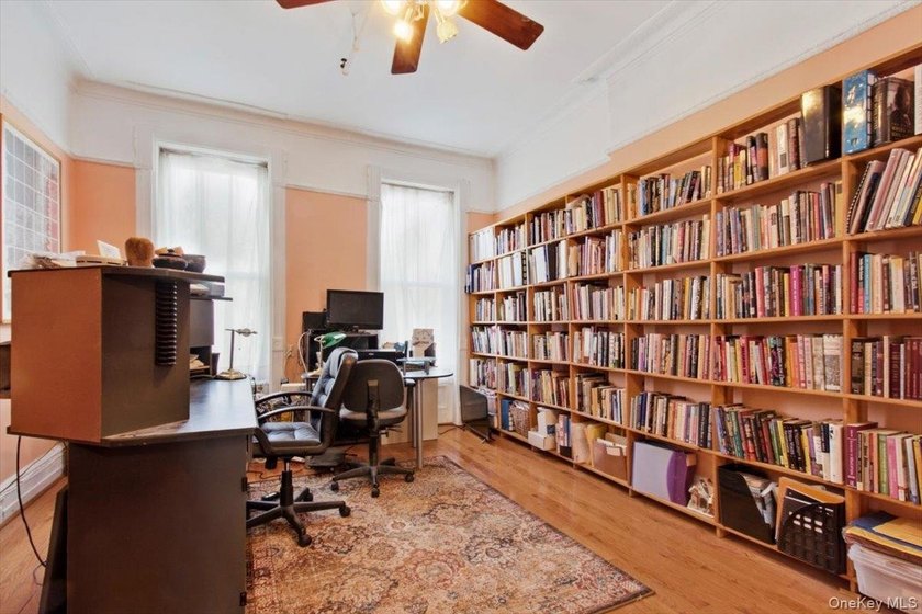 This meticulously maintained residence offers a spacious - photo 25