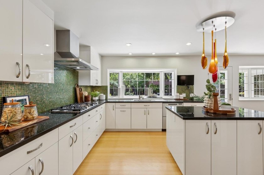 Welcome to 20210 La Paloma Avenue, an exquisite residence fully - photo 8