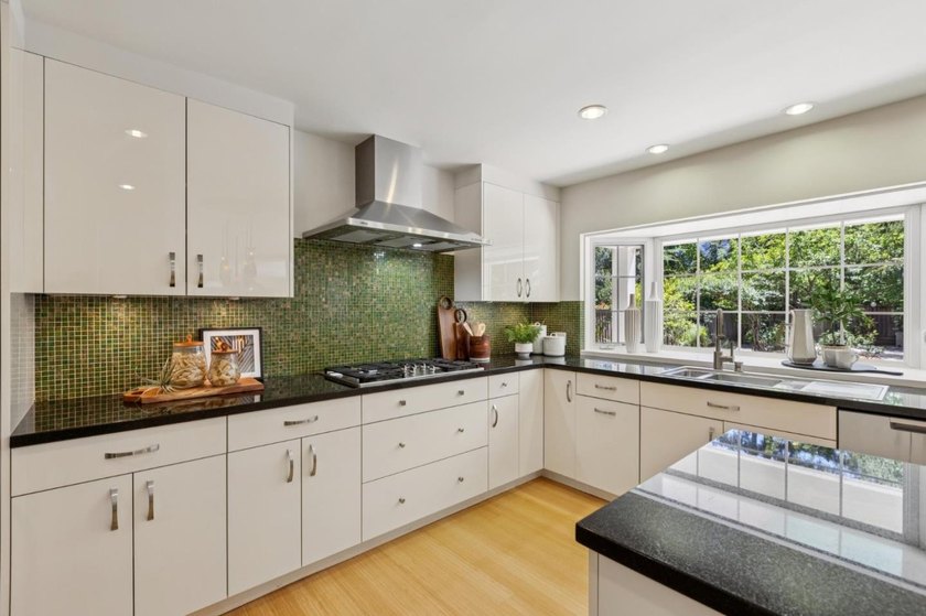 Welcome to 20210 La Paloma Avenue, an exquisite residence fully - photo 9