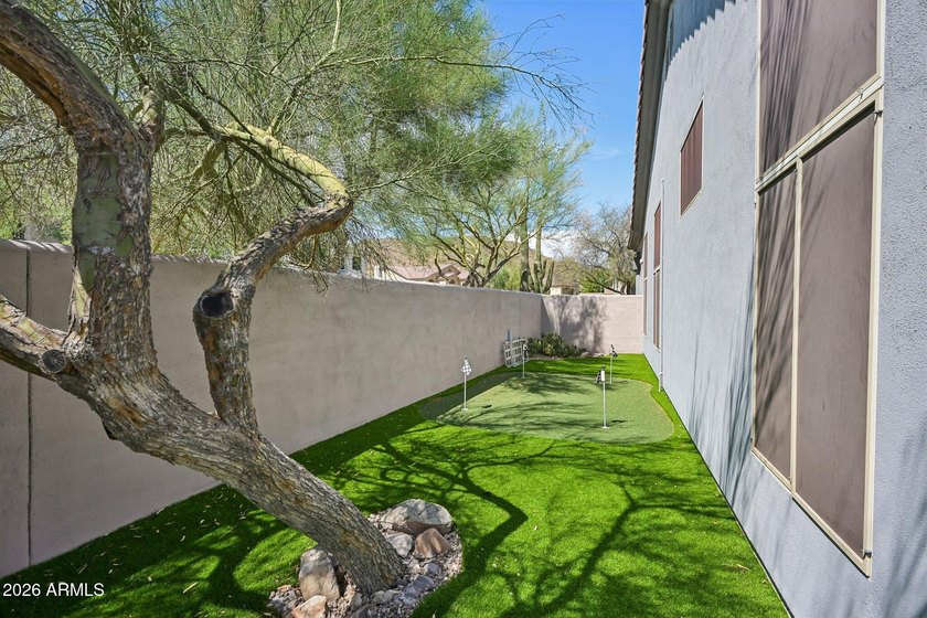 Superb location on a hillside lot with lush landscaping - photo 33