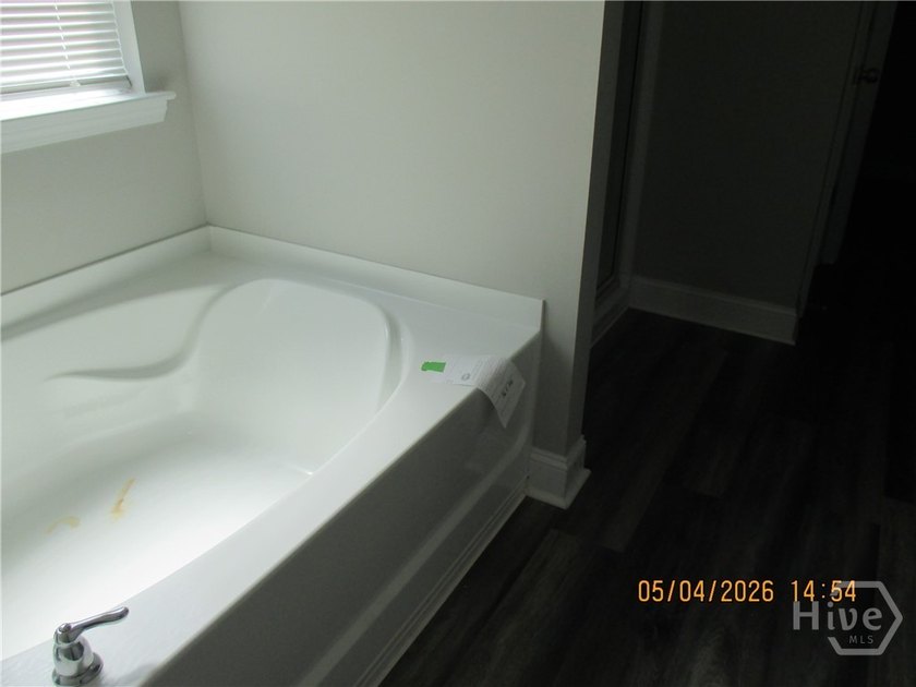 This open floor plan may be just what you want! Being sold AS-IS - photo 6