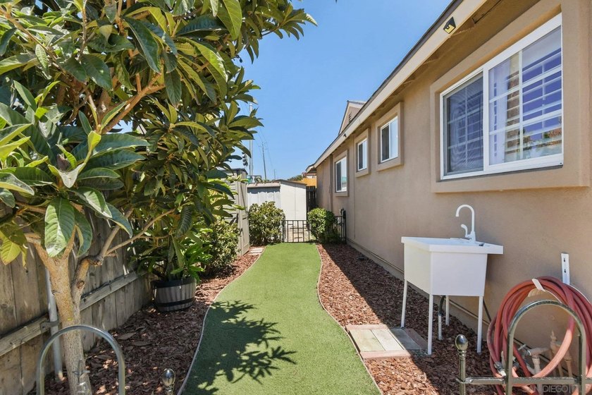 Situated on a huge, premium corner lot, this meticulously - photo 32
